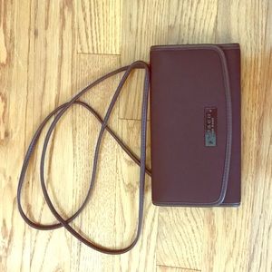 Coach clutch crossbody. Brown. Tri fold.